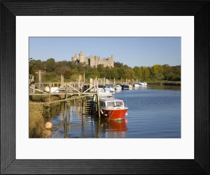 Framed Print : Colourful boats moored on the River Arun beneath the castle, Arundel, West Sussex Framed Print : Colourful boats moored on the River Arun beneath the castle, Arundel, West Sussex