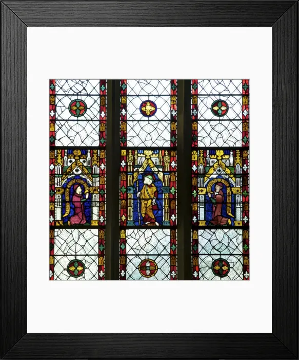 Framed Print : Close-up of 13th and 14th century stained glass windows of saint with kneeling patrons
