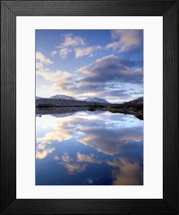 Framed Print : Dawn view of Loch Ba reflecting the sky and distant snow-capped mountains Framed Print : Dawn view of Loch Ba reflecting the sky and distant snow-capped mountains