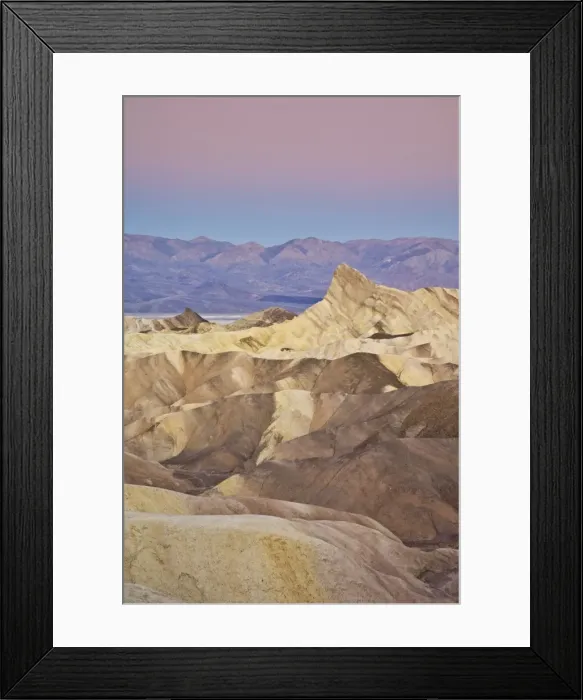 Framed Print : Manly Beacon and the Siltstone eroded foothills formations at Zabriske Poin at sunrise Framed Print : Manly Beacon and the Siltstone eroded foothills formations at Zabriske Poin at sunrise