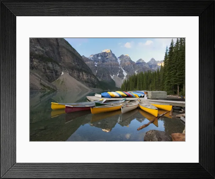 Framed Print : Canoes moored on Moraine Lake, Banff National Park, UNESCO World Heritage Site Framed Print : Canoes moored on Moraine Lake, Banff National Park, UNESCO World Heritage Site