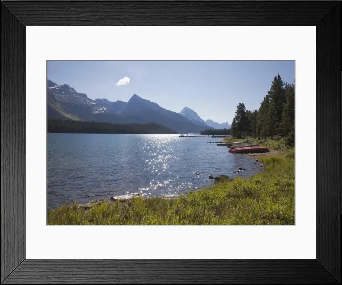 Framed Print : Morning light on Maligne Lake with canoes on shoreline, Jasper National Park Framed Print : Morning light on Maligne Lake with canoes on shoreline, Jasper National Park