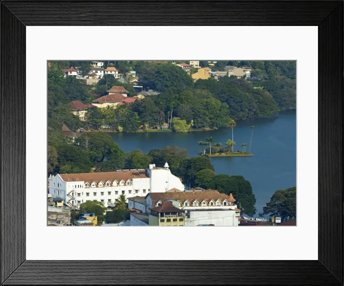 Framed Print : The old-fashioned white Queens Hotel by the famous lake in the old Sinhalese hill country capital, Kandy, Sri Framed Print : The old-fashioned white Queens Hotel by the famous lake in the old Sinhalese hill country capital, Kandy, Sri