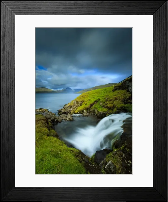 Framed Print : A waterfall cascading into the Vestmannasund, in the background is the picturesque island of Streymoy, Oyrargjogv, Vagar Island, Faroe Islands Framed Print : A waterfall cascading into the Vestmannasund, in the background is the picturesque island of Streymoy, Oyrargjogv, Vagar Island, Faroe Islands