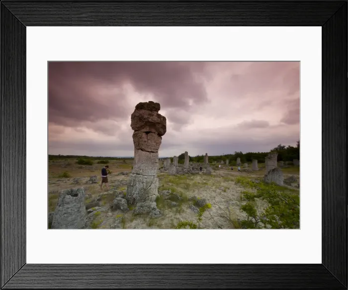 Framed Print : Sightseers at the rock formations known as the Stone Forest, 50 million year old tree-like stone columns, Varna Framed Print : Sightseers at the rock formations known as the Stone Forest, 50 million year old tree-like stone columns, Varna