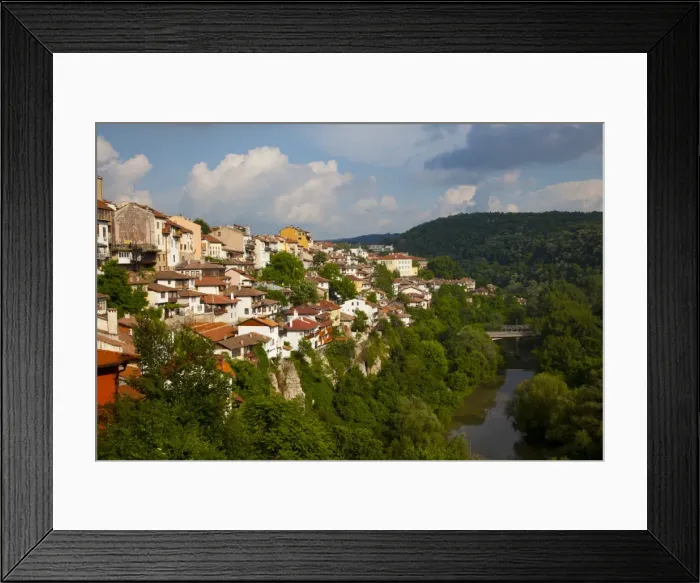 Framed Print : Stormy weather at dusk over hillside houses above the Yantra River, Veliko Tarnovo Framed Print : Stormy weather at dusk over hillside houses above the Yantra River, Veliko Tarnovo