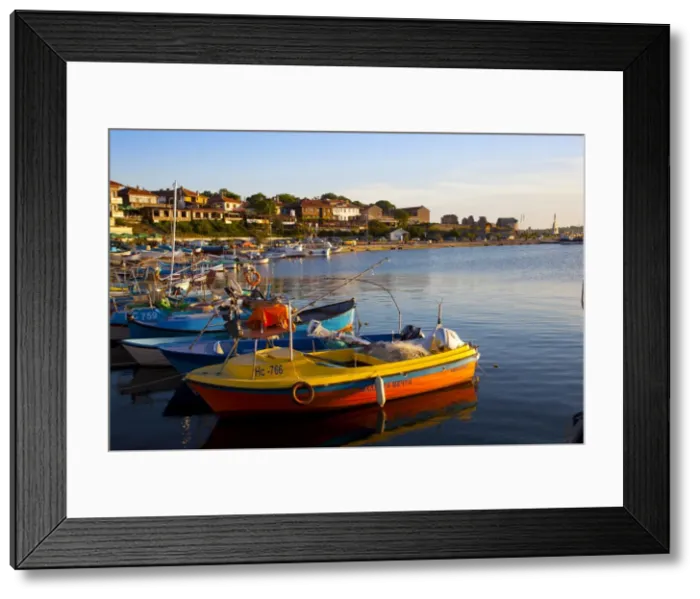 Framed Print : Fishing boats and view towards ramparts and ruins of the medieval fortification walls Framed Print : Fishing boats and view towards ramparts and ruins of the medieval fortification walls