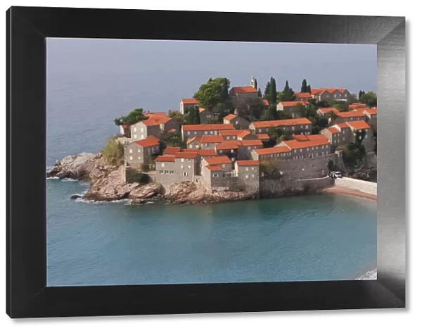 Beach and houses on the hotel island at Sveti Stefan on the Adriatic coast