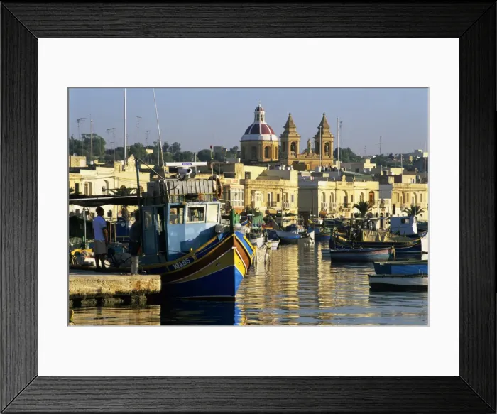 Framed Print : View across harbour with traditional Luzzu fishing boats, Marsaxlokk, Malta Framed Print : View across harbour with traditional Luzzu fishing boats, Marsaxlokk, Malta