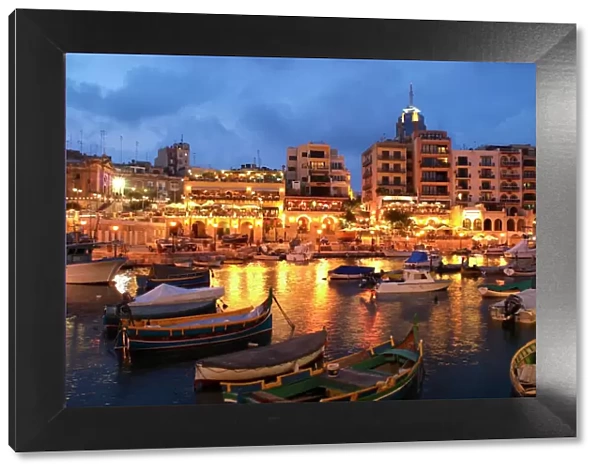 Evening across Spinola Bay with restaurants, St. Julian`s, Malta, Mediterranean, Europe