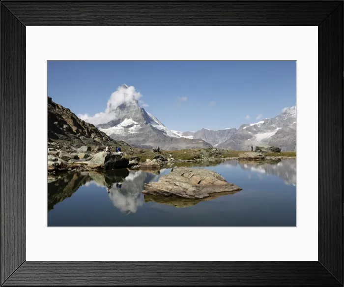 Framed Print : Hiker resting at Riffelsee and the Matterhorn behind, Zermatt, Valais, Swiss Alps Framed Print : Hiker resting at Riffelsee and the Matterhorn behind, Zermatt, Valais, Swiss Alps