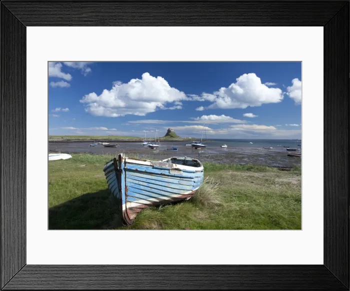 Framed Print : Old wooden fishing boat on a grassy bank with Lindisfarne harbour and Lindisfarne Castle in the background, Holy Island (Lindisfarne), Northumberland, England, United Framed Print : Old wooden fishing boat on a grassy bank with Lindisfarne harbour and Lindisfarne Castle in the background, Holy Island (Lindisfarne), Northumberland, England, United