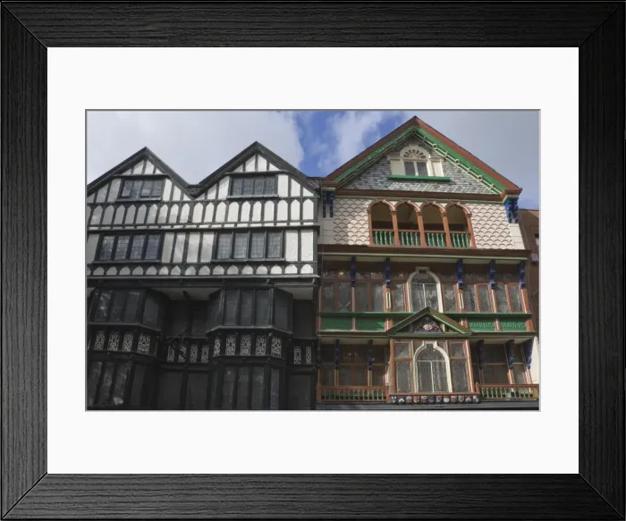 Framed Print : Timbered and decorated buildings on the High Street, Exeter, Devon, England Framed Print : Timbered and decorated buildings on the High Street, Exeter, Devon, England