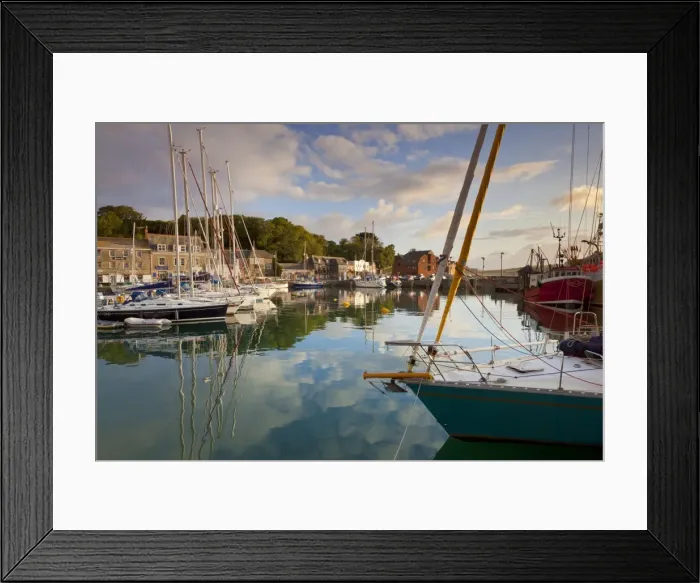 Framed Print : Low morning light and sailing yacht reflections at Padstow Harbour, Cornwall Framed Print : Low morning light and sailing yacht reflections at Padstow Harbour, Cornwall