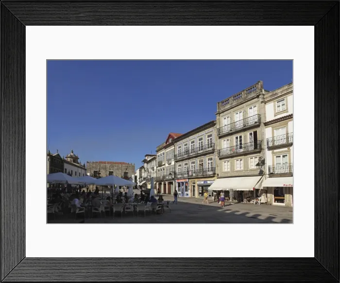 Framed Print : The main square (Praca da Republica), with street cafes and azulejo clad buildings Framed Print : The main square (Praca da Republica), with street cafes and azulejo clad buildings