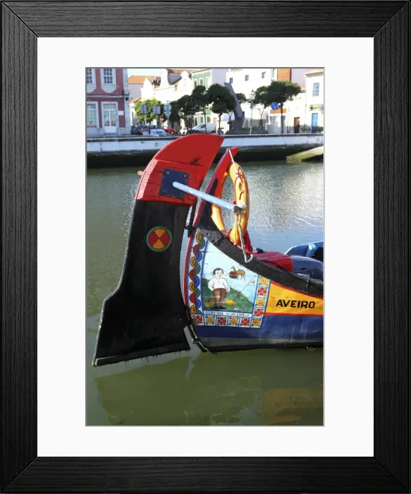Framed Print : Prow of a colourful, handpainted Moliceiro boat used for sightseeing trips along the canals of Aveiro, Beira Litoral Framed Print : Prow of a colourful, handpainted Moliceiro boat used for sightseeing trips along the canals of Aveiro, Beira Litoral