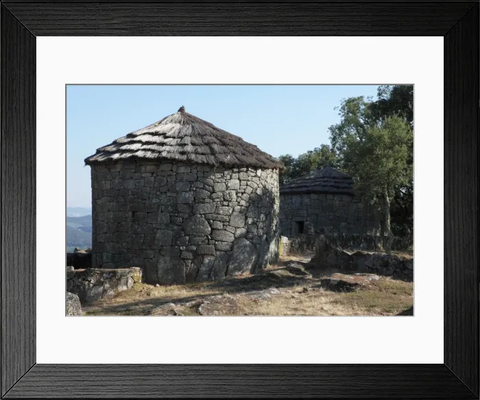 Framed Print : Reconstructed round houses in the Celtic hill settlement dating to the Iron Age at Citania de Briteiros, Minho Framed Print : Reconstructed round houses in the Celtic hill settlement dating to the Iron Age at Citania de Briteiros, Minho