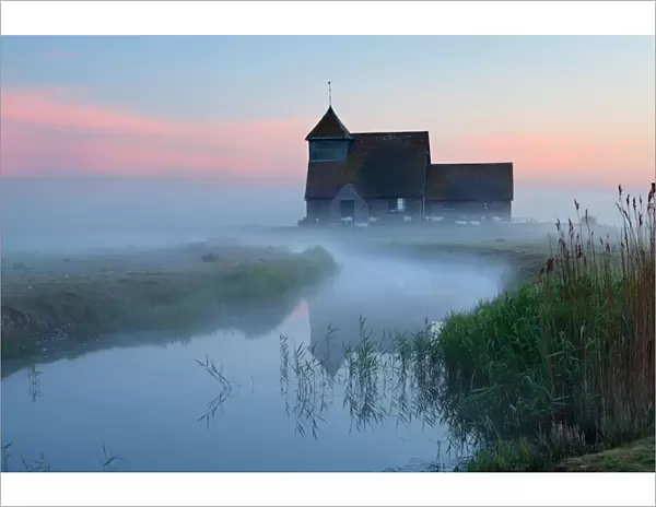 Fairfield church in dawn mist, Romney Marsh, near Rye, Kent, England, United Kingdom