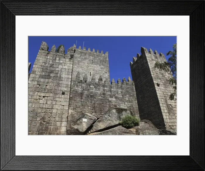 Framed Print : The walls of the castle (Castelo de Guimaraes) which overlooks the city of Guimaraes Framed Print : The walls of the castle (Castelo de Guimaraes) which overlooks the city of Guimaraes