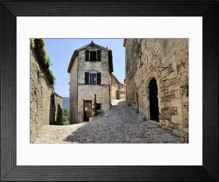 Framed Print : Cobbled alley in the picturesque medieval village of Lacoste, Provence, France, Europe Framed Print : Cobbled alley in the picturesque medieval village of Lacoste, Provence, France, Europe