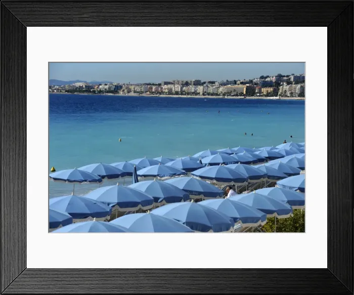 Framed Print : Beach umbrellas viewed from the Promenade des Anglais, Nice, Alpes Maritimes Framed Print : Beach umbrellas viewed from the Promenade des Anglais, Nice, Alpes Maritimes