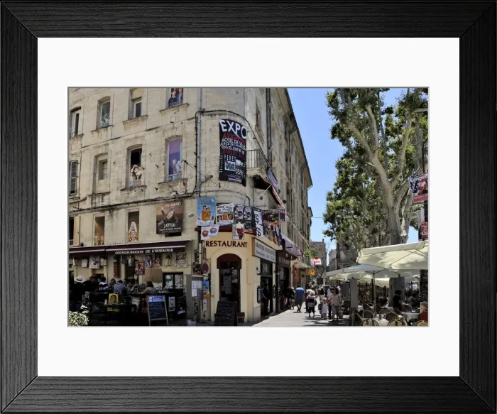 Framed Print : Posters advertising the theatre festival on a building with pictures painted on the windows Framed Print : Posters advertising the theatre festival on a building with pictures painted on the windows