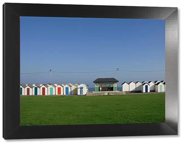Beach huts and promenade shelter, Paignton, Devon, England, United Kingdom, Europe
