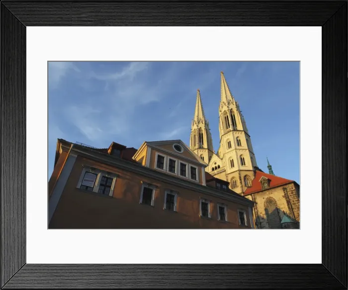 Framed Print : Evening sunshine lights the Neo-Gothic spires of the medieval St. Peters Church Framed Print : Evening sunshine lights the Neo-Gothic spires of the medieval St. Peters Church
