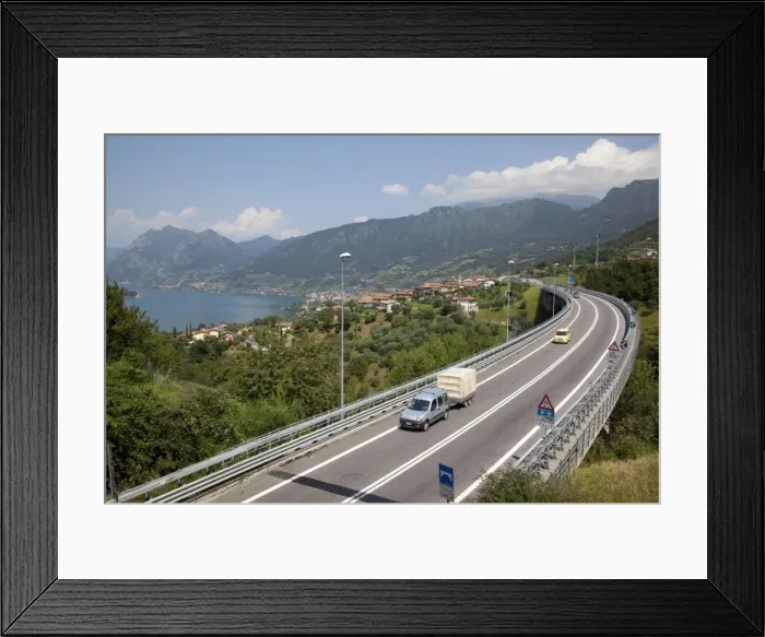 Framed Print : Lake and the S10 road, Lake Iseo, Lombardy, Italian Lakes, Italy, Europe Framed Print : Lake and the S10 road, Lake Iseo, Lombardy, Italian Lakes, Italy, Europe