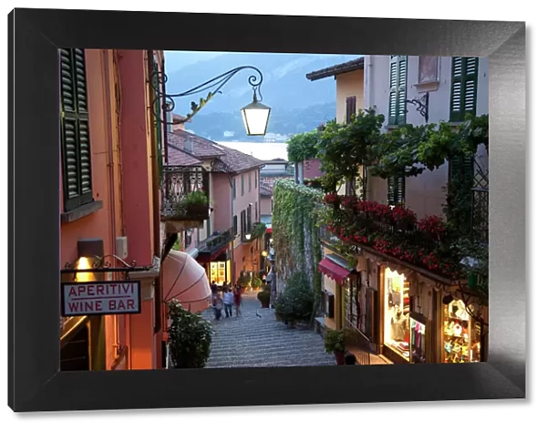 Shopping street at dusk, Bellagio, Lake Como, Lombardy, Italy, Europe