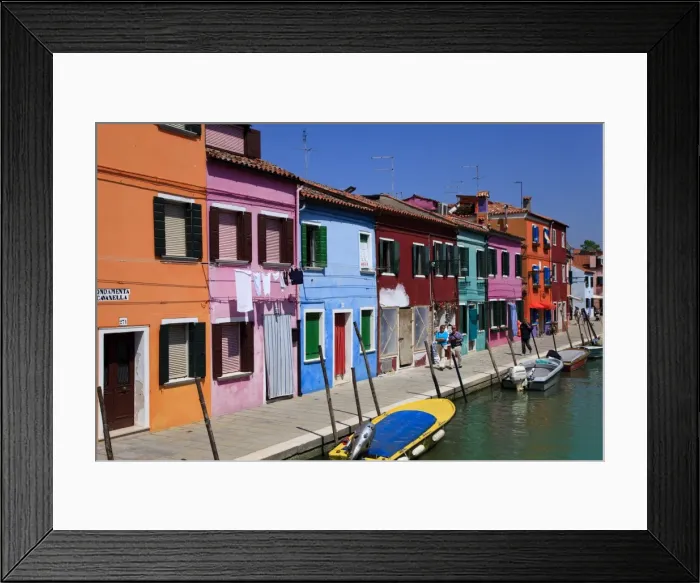 Framed Print : Colourfully painted houses situated on canal banks on the island of Burano Framed Print : Colourfully painted houses situated on canal banks on the island of Burano