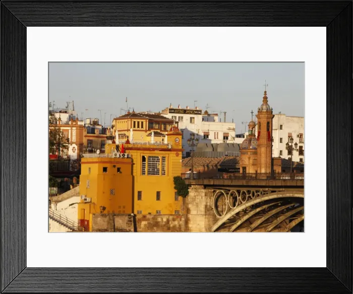 Framed Print : Buildings on the bank of the Guadalquivir River, Seville, Andalucia, Spain, Europe Framed Print : Buildings on the bank of the Guadalquivir River, Seville, Andalucia, Spain, Europe