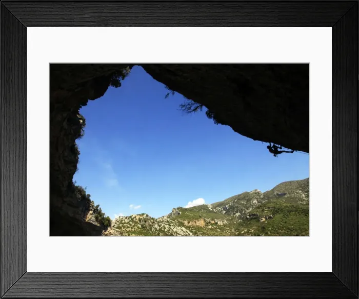 Framed Print : A climber tackles an overhanging climb in the Mascun canyon, Rodellar, Aragon Framed Print : A climber tackles an overhanging climb in the Mascun canyon, Rodellar, Aragon