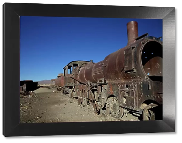 Rusting locomotive at train graveyard, Uyuni, Bolivia, South America