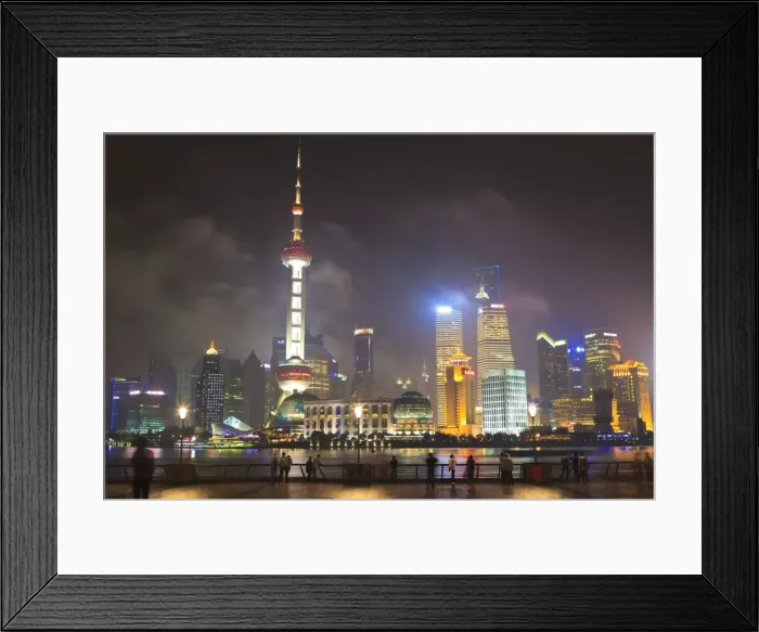 Framed Print : Pudong skyline at night across the Huangpu River, Oriental Pearl tower on left, Shanghai, China, Asia Framed Print : Pudong skyline at night across the Huangpu River, Oriental Pearl tower on left, Shanghai, China, Asia
