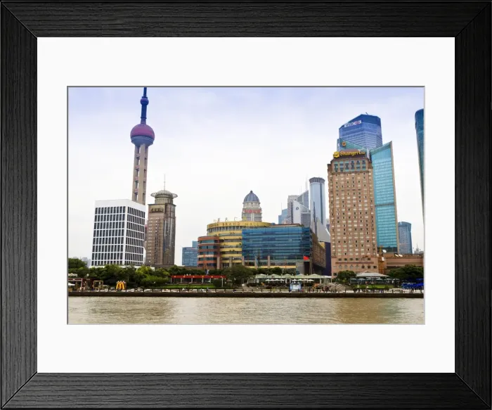 Framed Print : Pudong skyline across the Huangpu River, Oriental Pearl tower on left, Shanghai, China, Asia Framed Print : Pudong skyline across the Huangpu River, Oriental Pearl tower on left, Shanghai, China, Asia