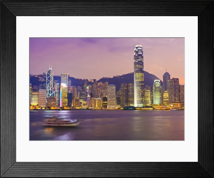 Framed Print : The skyscrapers of Hong Kong Island illuminated at sunset across Victoria Harbour, Two International Finance Centre tower (2IFC), on the right, Hong Kong, China, Asia Framed Print : The skyscrapers of Hong Kong Island illuminated at sunset across Victoria Harbour, Two International Finance Centre tower (2IFC), on the right, Hong Kong, China, Asia