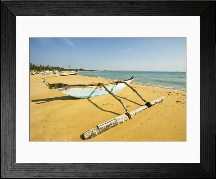 Framed Print : Old style outrigger fishing boat and post-2004 tsunami foreign donated newer ones beyond, Arugam Bay, Eastern Province, Sri Lanka, Asia Framed Print : Old style outrigger fishing boat and post-2004 tsunami foreign donated newer ones beyond, Arugam Bay, Eastern Province, Sri Lanka, Asia