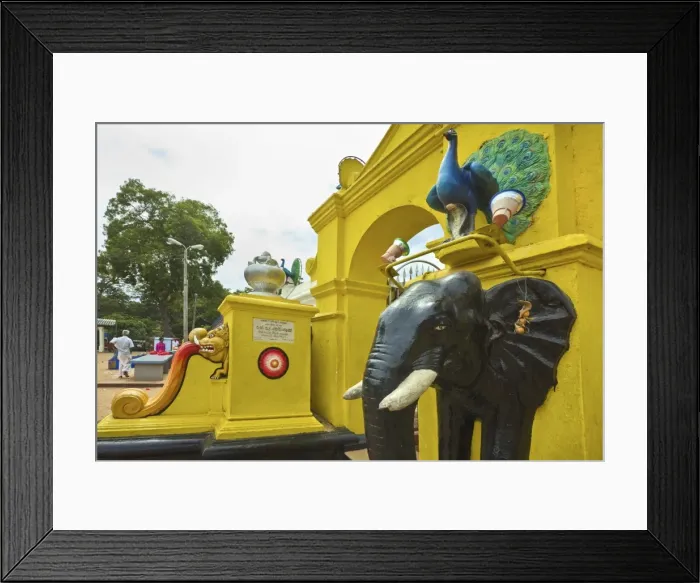 Framed Print : Maha Devale Buddhist and Hindu temple to elephant deity Ganesh in this sacred multi faith town, Kataragama, Uva Province, Sri Lanka, Asia Framed Print : Maha Devale Buddhist and Hindu temple to elephant deity Ganesh in this sacred multi faith town, Kataragama, Uva Province, Sri Lanka, Asia
