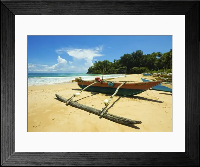 Framed Print : Outrigger fishing boat at this quiet south coast retreat beach, Talalla, near Matara, Southern Province, Sri Lanka, Asia Framed Print : Outrigger fishing boat at this quiet south coast retreat beach, Talalla, near Matara, Southern Province, Sri Lanka, Asia