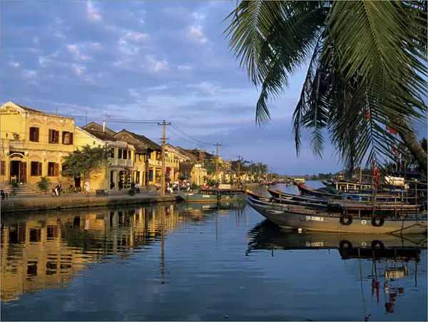 View of old town and fishing boats along Thu Bon River, Hoi An, UNESCO World Heritage Site, South Central Coast, Vietnam, Indochina, Southeast Asia, Asia