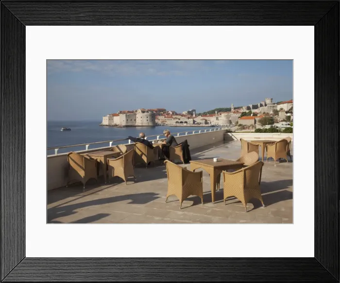 Framed Print : People relaxing on terrace of Excelsior Hotel with Dubrovnik Old Town in the distance, Dubrovnik, Croatia, Europe Framed Print : People relaxing on terrace of Excelsior Hotel with Dubrovnik Old Town in the distance, Dubrovnik, Croatia, Europe