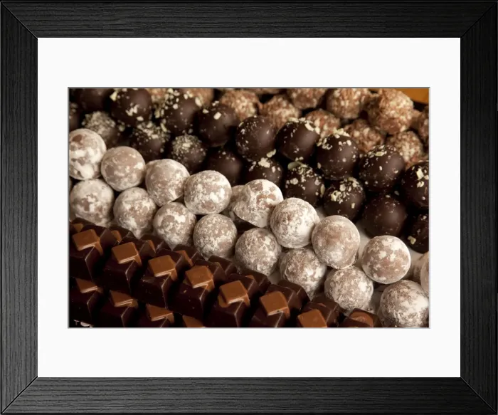 Framed Print : Close-up of rows of chocolates in a French cafe, France, Europe Framed Print : Close-up of rows of chocolates in a French cafe, France, Europe