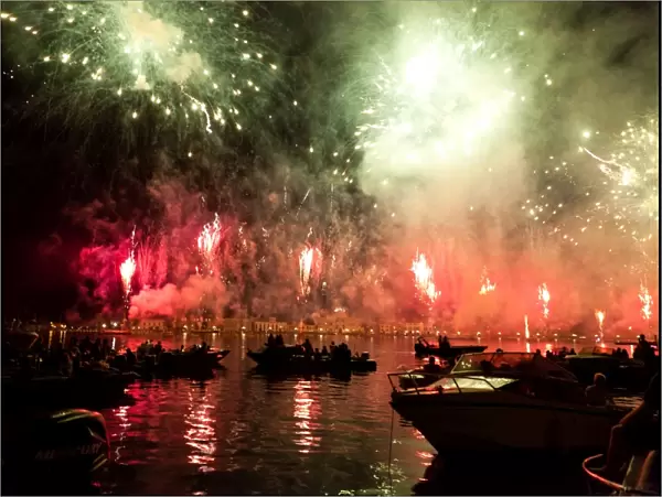 The amazing fireworks display during the night of Redentore celebration in the basin of St. Mark, Venice, Veneto, Italy, Europe