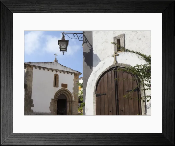Framed Print : Wooden door of St. Peters Church (Igreja de Sao Pedro) in the walled medieval town of Obidos, Estremadura, Portugal, Europe Framed Print : Wooden door of St. Peters Church (Igreja de Sao Pedro) in the walled medieval town of Obidos, Estremadura, Portugal, Europe