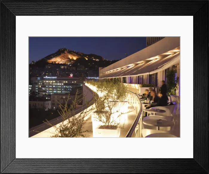 Framed Print : Rooftop terrace bar at the Athens Hilton with Lykavittos Hill illuminated at night, Athens, Greece, Europe Framed Print : Rooftop terrace bar at the Athens Hilton with Lykavittos Hill illuminated at night, Athens, Greece, Europe