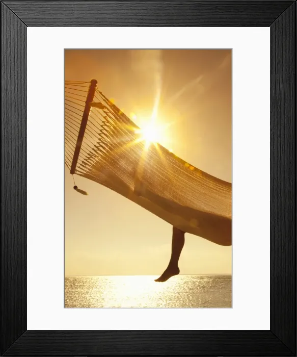 Framed Print : Woman in a hammock on the beach, Florida, United States of America, North America