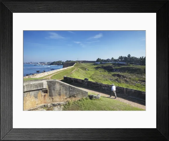 Framed Print : Man walking on Fort ramparts, Galle, UNESCO World Heritage Site, Southern Province, Sri Lanka, Asia Framed Print : Man walking on Fort ramparts, Galle, UNESCO World Heritage Site, Southern Province, Sri Lanka, Asia