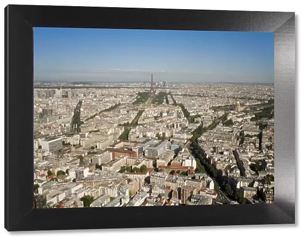 View of city with the Eiffel Tower in distance, from the Tour Montparnasse, Paris, France, Europe