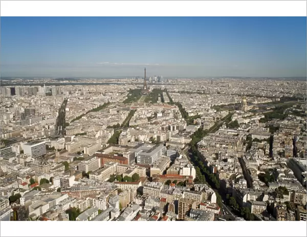 View of city with the Eiffel Tower in distance, from the Tour Montparnasse, Paris, France, Europe